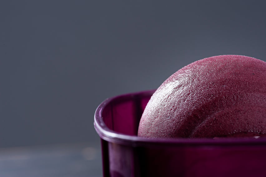 Close-up of frozen Brazilian açaí in a purple box.